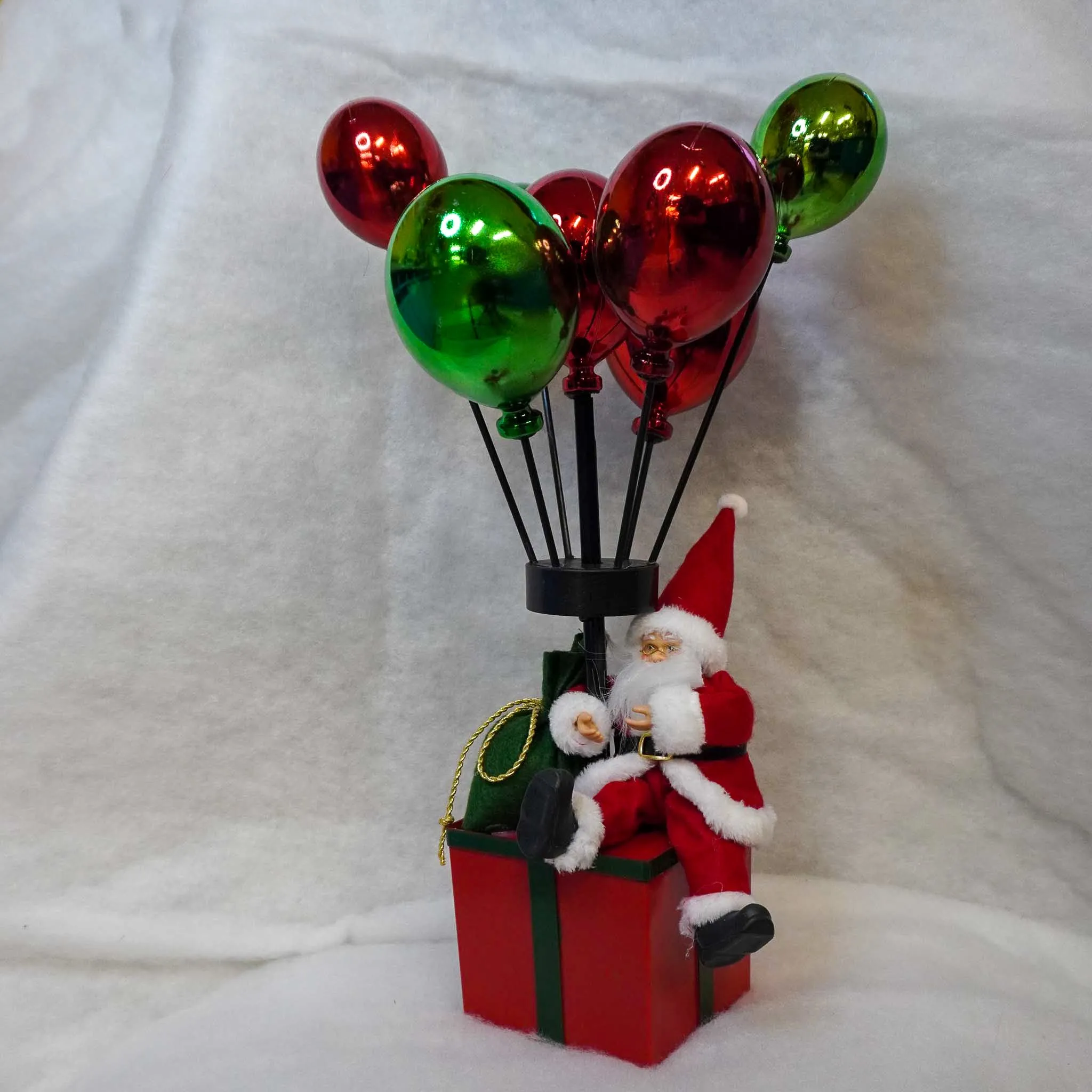 Santa Sitting on Parcel with Balloons 50cm (Small)